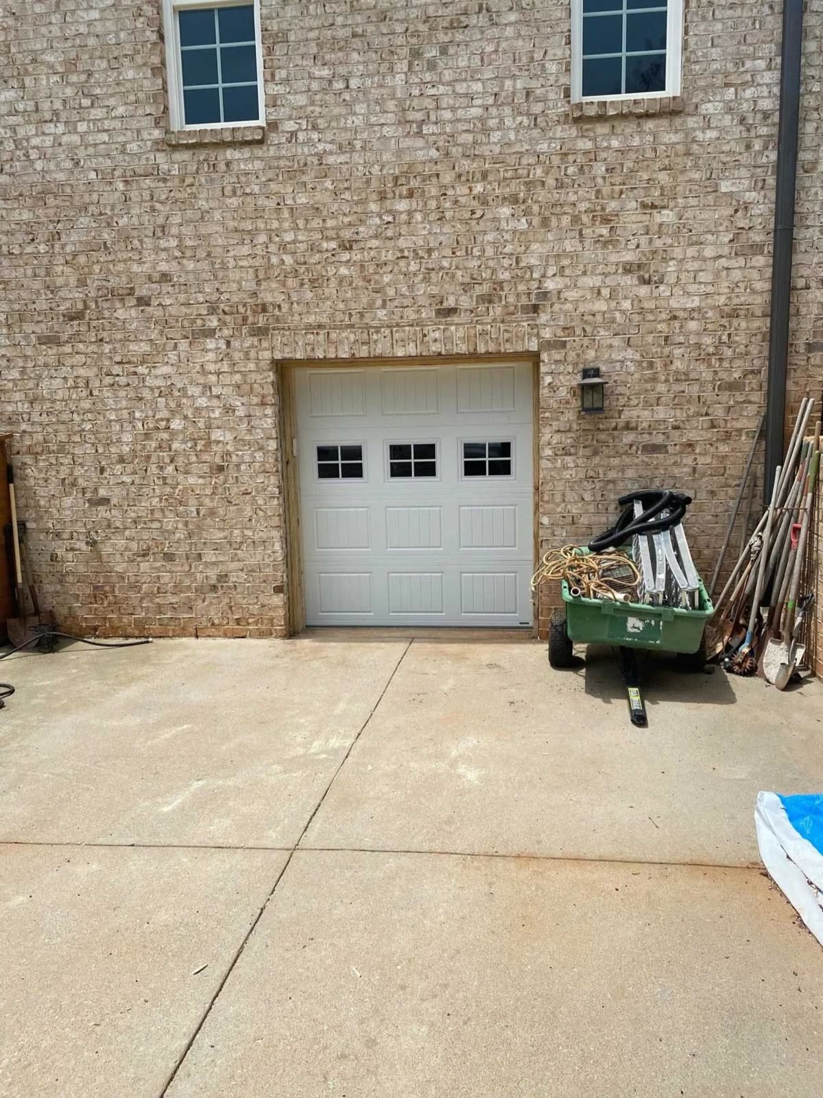 White carriage-style garage door installed near Lewisville NC